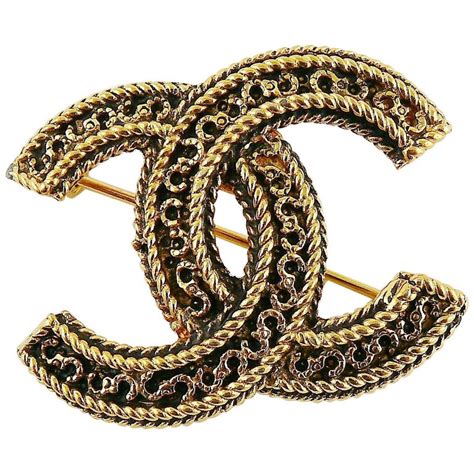 gold chanel brooch|vintage chanel brooches.